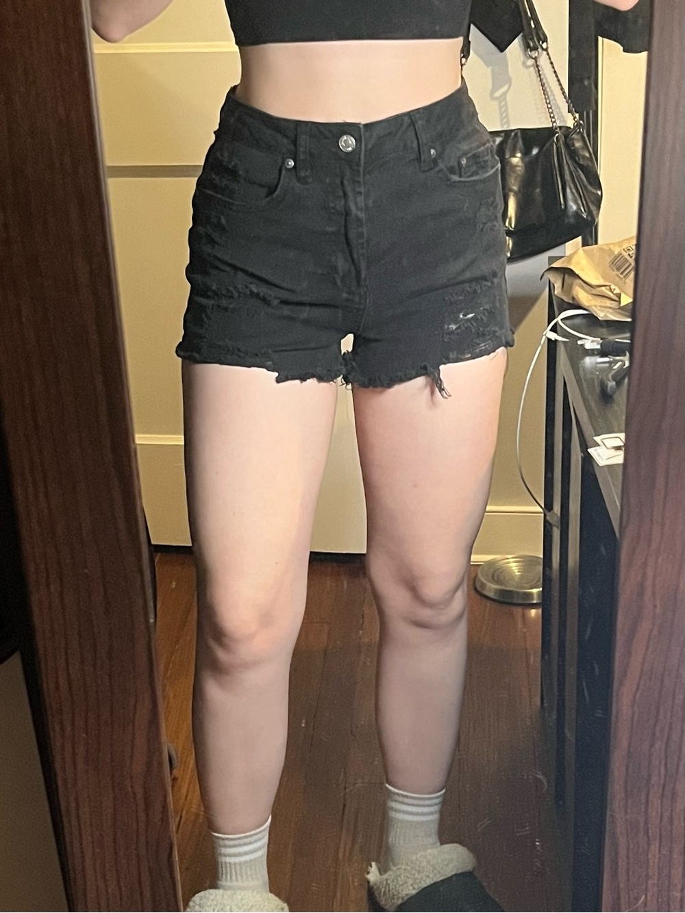 Black distressed jean shorts